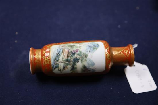 A Chinese coral ground famille rose cylindrical vase, Qianlong mark, Republic period, H. 15cm excluding wood stand